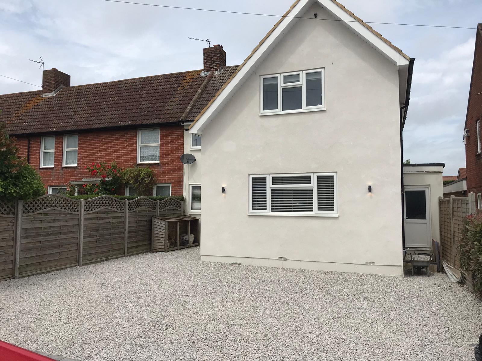 Freshly finished exterior render by Acclaim Home Improvements