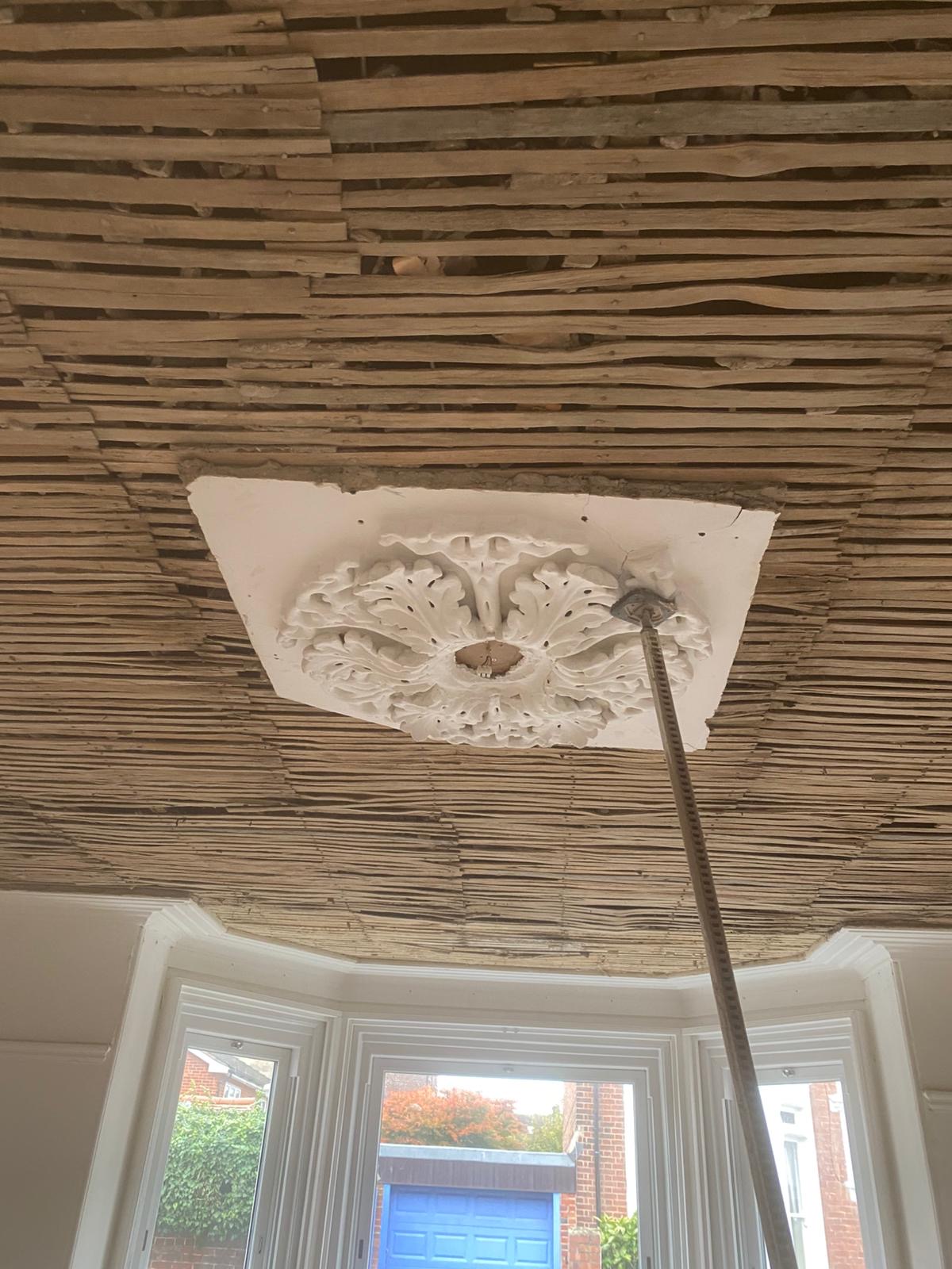 Decorative ceiling restoration before work